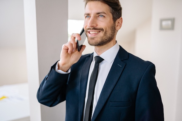 Property manager on the phone with a tenant